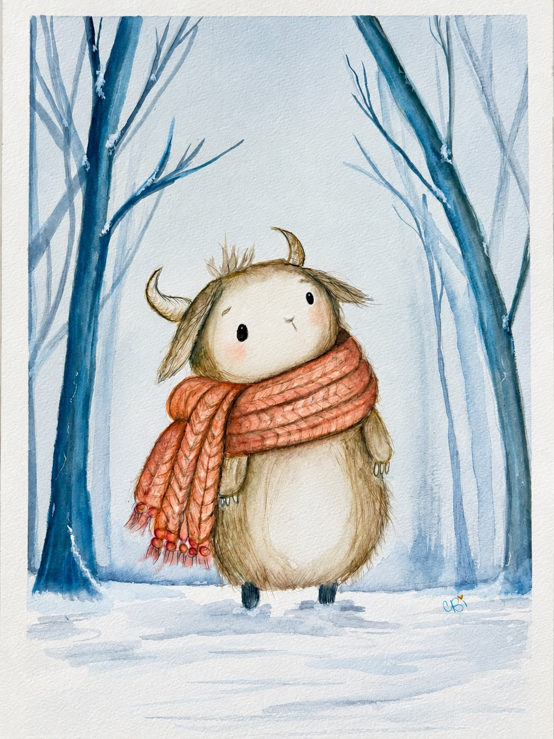 Bram, a small horned woodland creature in a coral knitted scarf, standing among blue trees in the snow; watercolor artwork with the CBi signature.