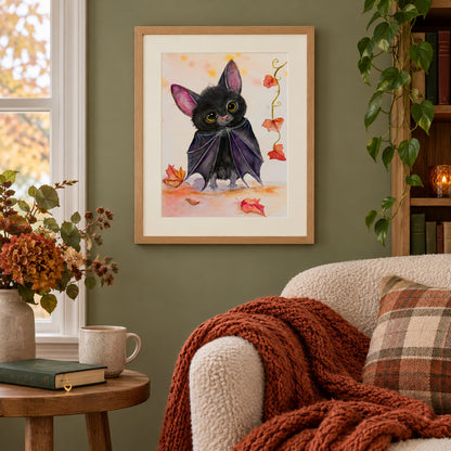 Batinsky print in an oak frame above a cream reading chair with a rust knitted blanket.