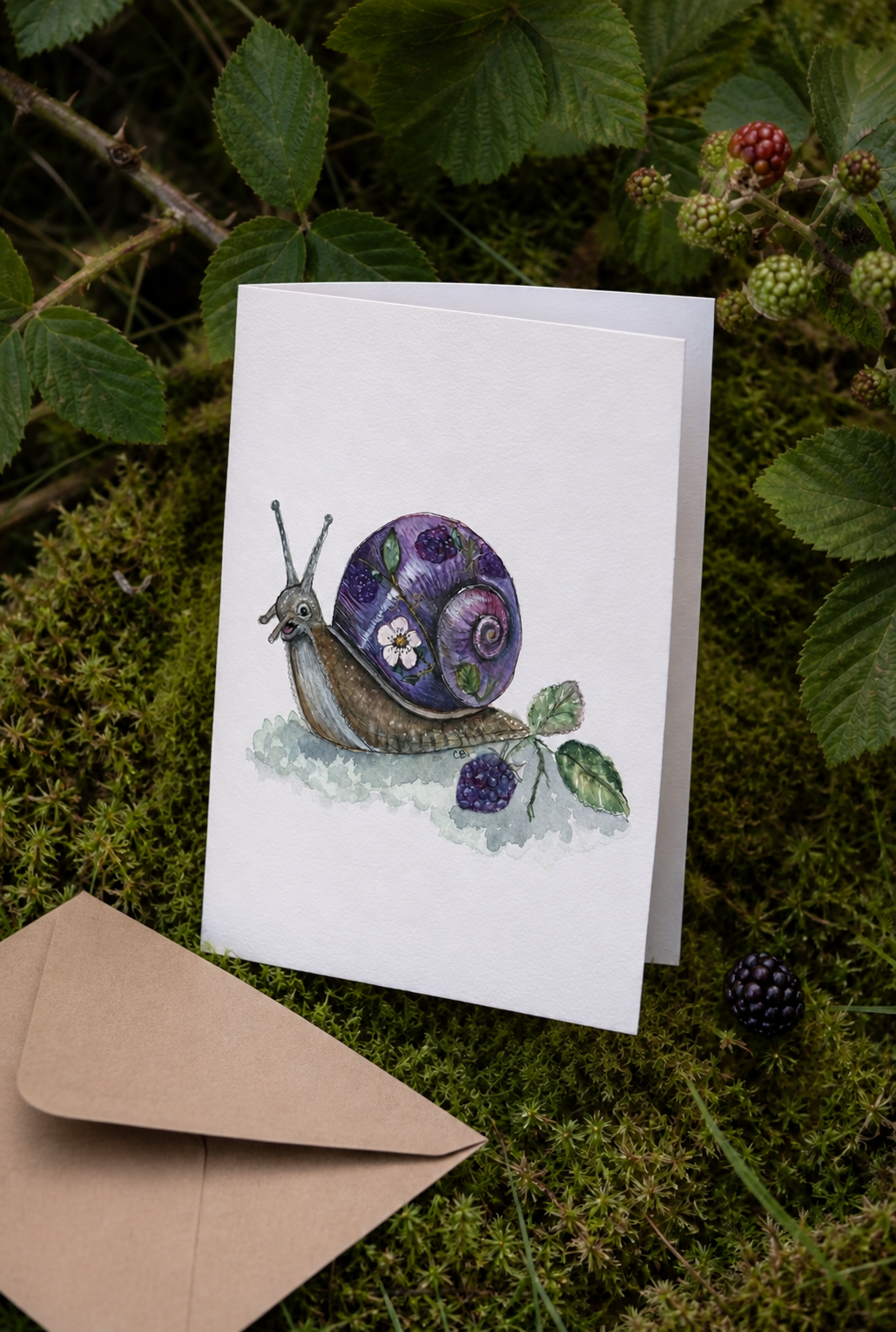 Bramble folded greeting card with envelope among moss and blackberry leaves