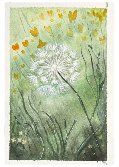 Front of a blank dandelion greeting card featuring a white seed head, soft green grasses and golden-yellow watercolor flowers.