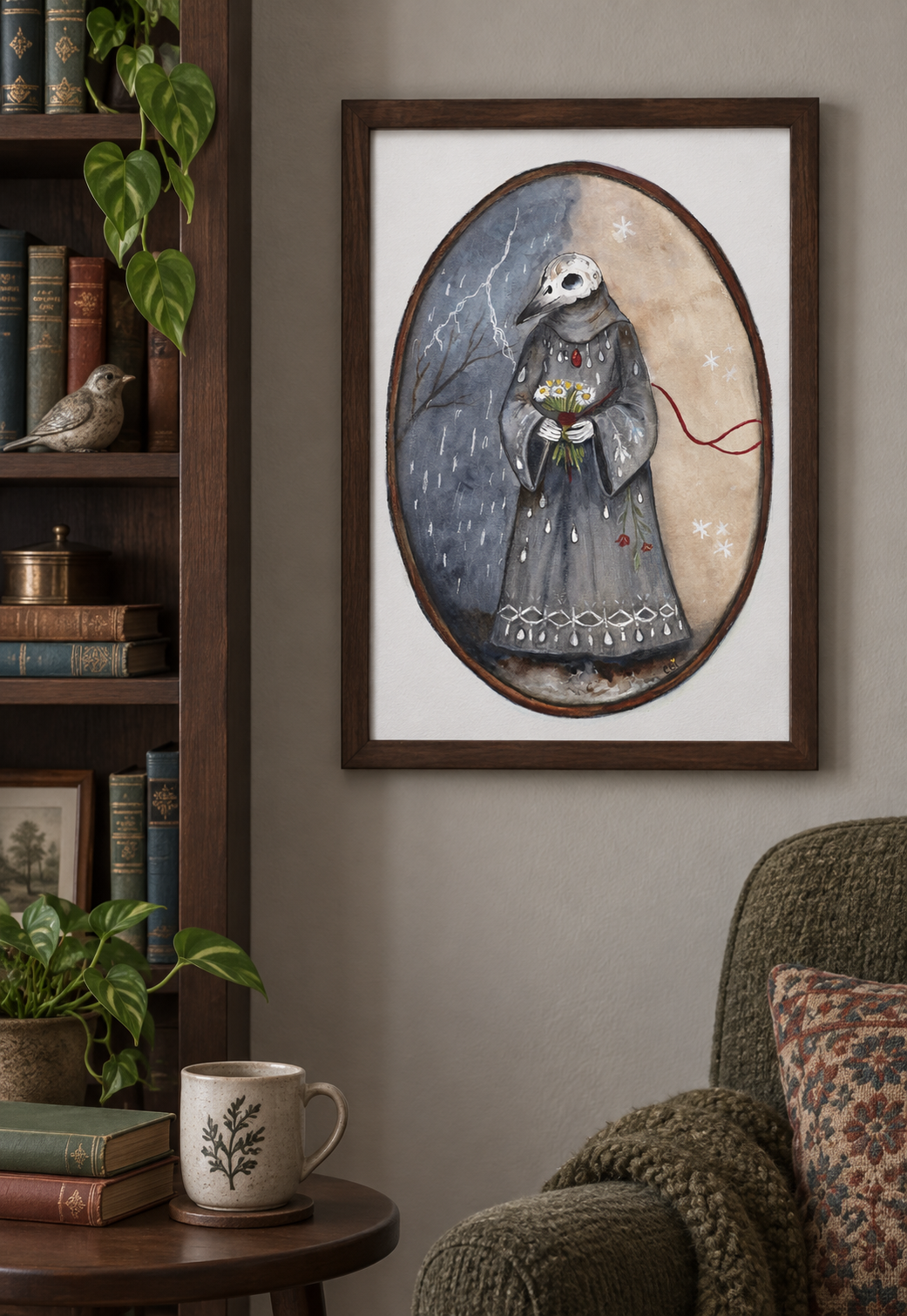 The Keeper Between Seasons print in a dark wood frame beside library shelves and a reading chair.