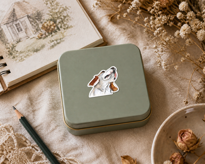 Maple dog sticker on a keepsake tin