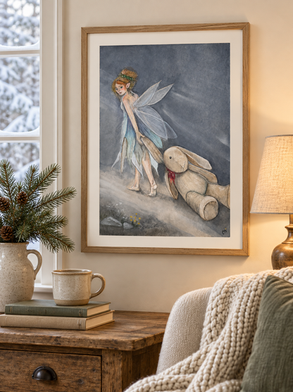 Oona & the Rabbit fine art print framed in a cozy winter reading nook with snow outside, evergreen branches, books, and a knitted blanket.